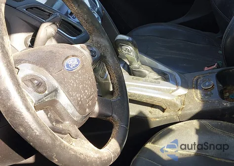 2012 Ford Focus Titanium z USA, uszkodzony, nr VIN 1FAHP3N29CL391040